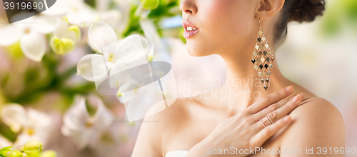 Image of close up of beautiful woman with earrings