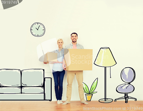 Image of couple with cardboard boxes moving to new home