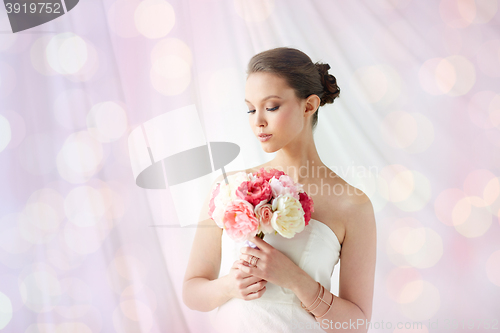 Image of beautiful asian woman with flower and jewelry