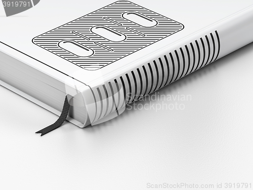 Image of Medicine concept: closed book, Pills Blister on white background