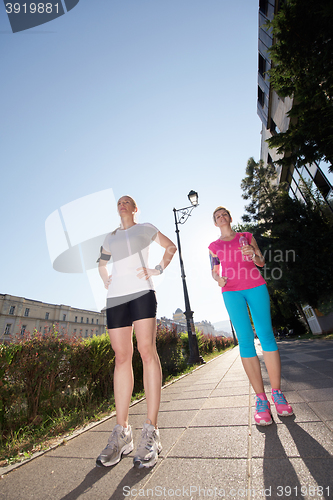 Image of female friends jogging