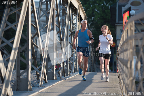 Image of couple jogging