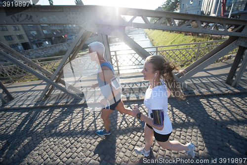 Image of couple jogging