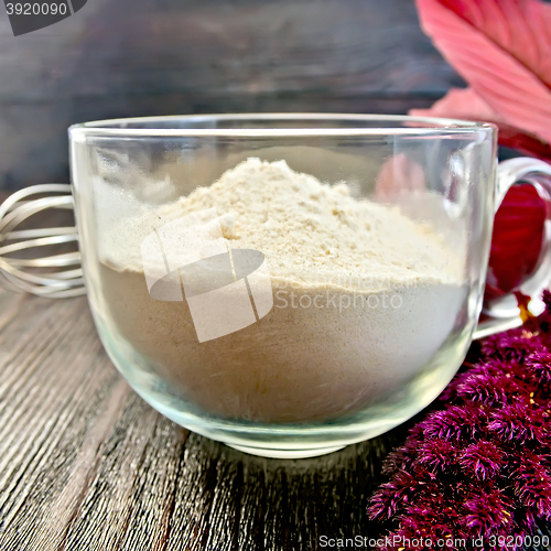 Image of Flour amaranth in cup with mixer on board