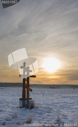 Image of Orthodox church crosses in sunset