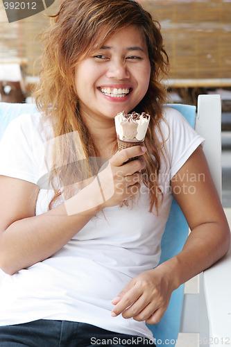 Image of Girl eating icecream