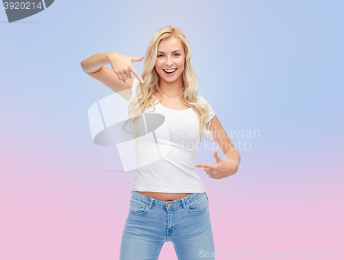 Image of happy young woman or teenage girl in white t-shirt