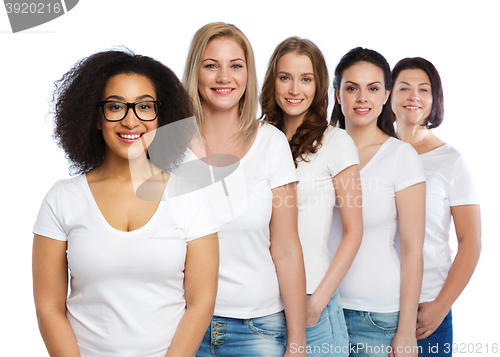 Image of group of happy different women in white t-shirts