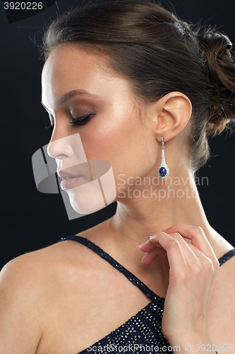 Image of close up of beautiful asian woman with earring