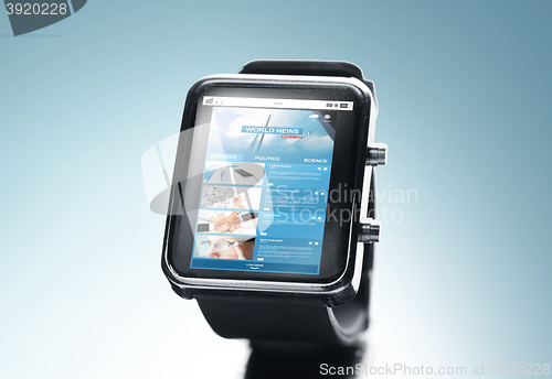 Image of close up of smart watch with news web page