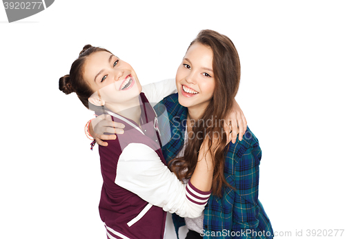 Image of happy smiling pretty teenage girls hugging