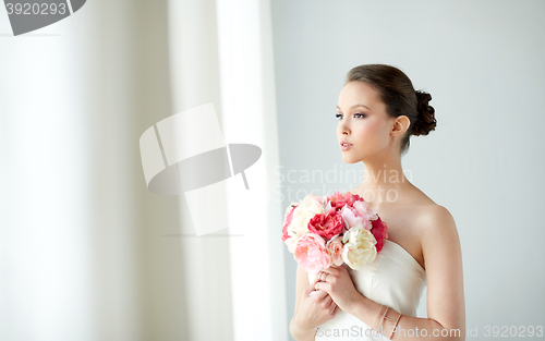 Image of beautiful asian woman with flower and jewelry