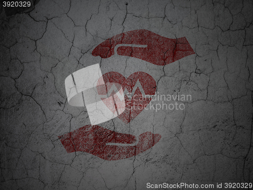 Image of Insurance concept: Heart And Palm on grunge wall background