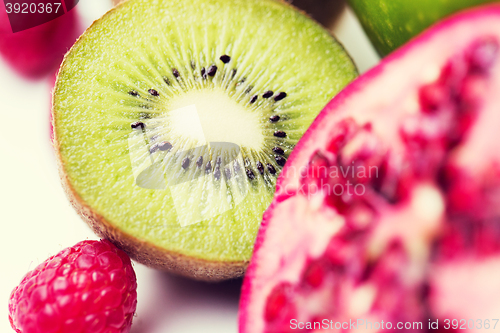 Image of close up of ripe kiwi and other fruits