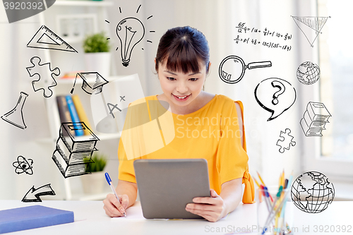 Image of asian woman student with tablet pc at home