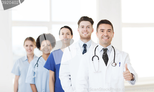 Image of group of happy doctors at hospital