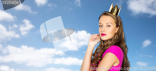 Image of young woman or teen girl in pink dress