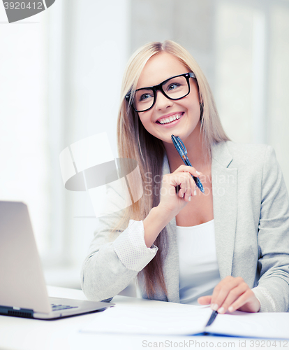 Image of businesswoman with documents