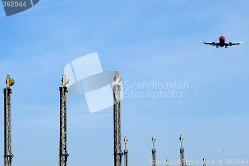 Image of Plane and lights in airport