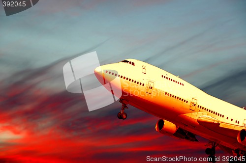 Image of Air travel - plane and sunset