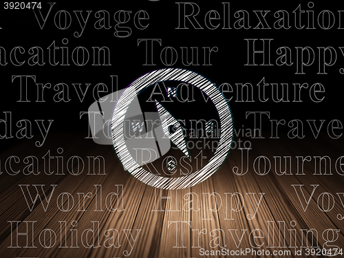 Image of Travel concept: Compass in grunge dark room