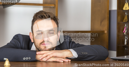 Image of Portrait of a Tired Receptionist