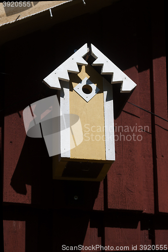 Image of yellow birdhouse