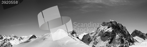 Image of Black and white panorama of snowy mountains