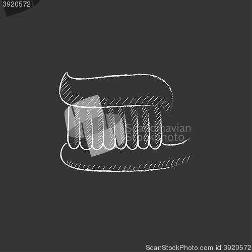 Image of Toothbrush with toothpaste. Drawn in chalk icon.