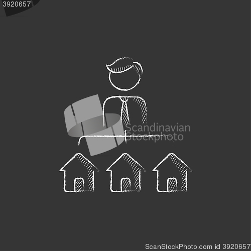 Image of Real estate agent with three houses. Drawn in chalk icon.