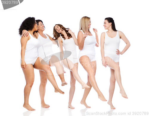 Image of group of happy different women in white underwear