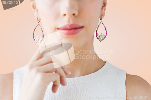 Image of close up of beautiful woman face with earrings