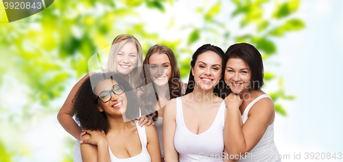 Image of group of happy different women in white underwear