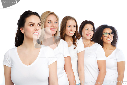 Image of group of happy different women in white t-shirts