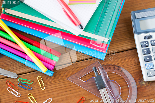 Image of close up of stationery or school supplies on table