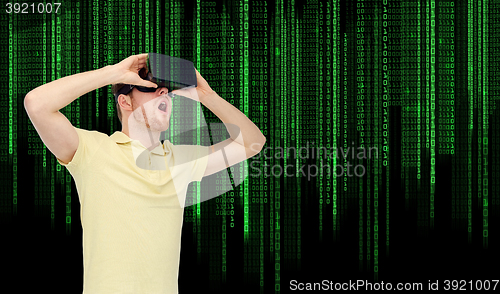 Image of happy man in virtual reality headset or 3d glasses