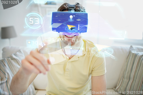 Image of young man in virtual reality headset or 3d glasses