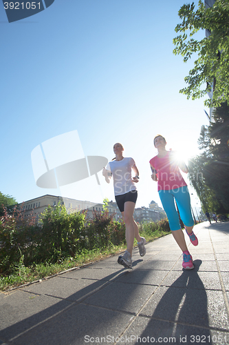 Image of female friends jogging