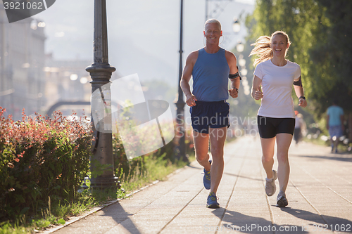 Image of couple jogging