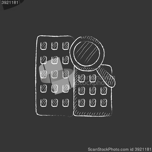 Image of Condominium and magnifying glass. Drawn in chalk icon.