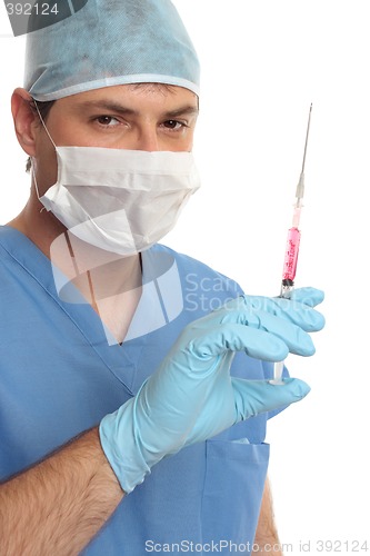 Image of Surgeon haematologist  in scrubs with syringe needle