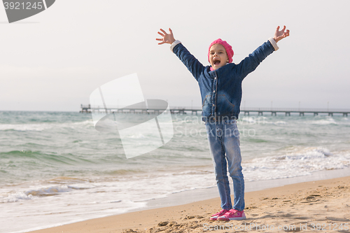 Image of Seven-year girl rejoices arrival of the sea