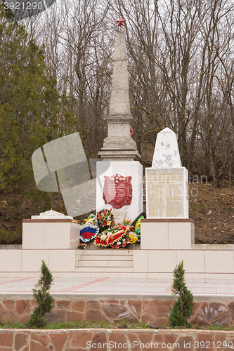 Image of Sukko, Russia - March 15, 2016: A view of the common grave of Soviet soldiers and civilians in the village of Sukko, who died fighting Nazi invaders and state in the 1942-1943 year