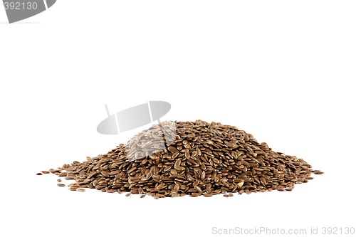 Image of A nice pile of some flax-seed isolated on white background