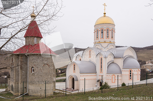 Image of Varvarovka, Russia - March 15, 2016: New and old church in the village of Great Martyr Barbara Varvarovka, a suburb of Anapa, Krasnodar Krai