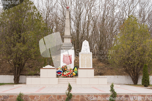 Image of Sukko, Russia - March 15, 2016: A view of the common grave of Soviet soldiers and civilians in the village of Sukko, who died fighting Nazi invaders and state in the 1942-1943 year