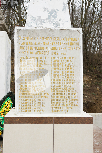 Image of Sukko, Russia - March 15, 2016: Lists of those killed at the mass grave of Soviet soldiers and civilians in the village of Sukko, who died fighting Nazi invaders and state in the 1942-1943 year