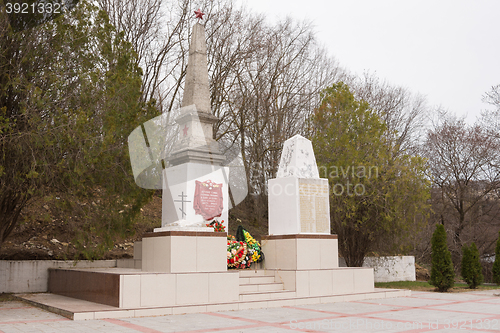 Image of Sukko, Russia - March 15, 2016: A view of the common grave of Soviet soldiers and civilians in the village of Sukko, who died fighting Nazi invaders and state in the 1942-1943 year
