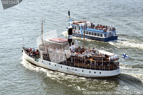 Image of HELSINKI, FINLAND – AUGUST 8, 2014: two pleasure ships in the 