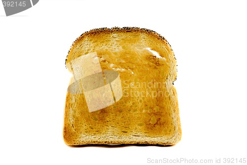 Image of A singel slice of toasted bread isolated on white background